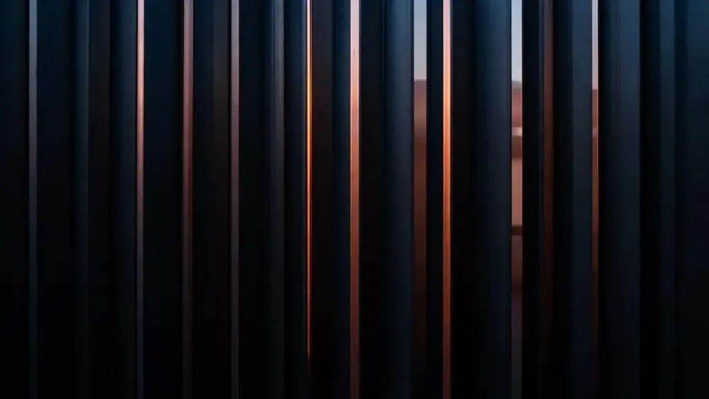 Architectural louvers with copper light symbolizing purpose and direction